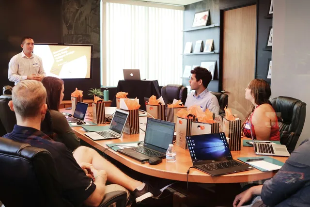 Sales team reviewing leads between meetings